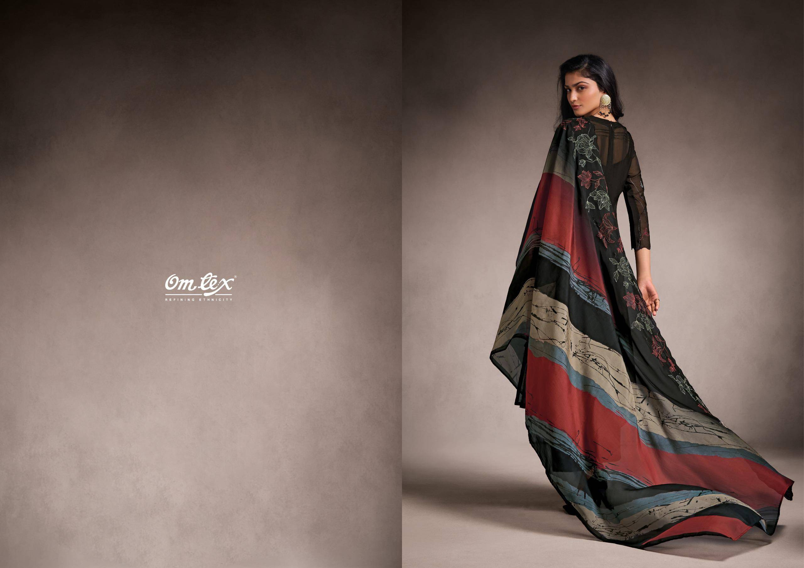 Omtex tanira fancy dress material wholesale in mumbai